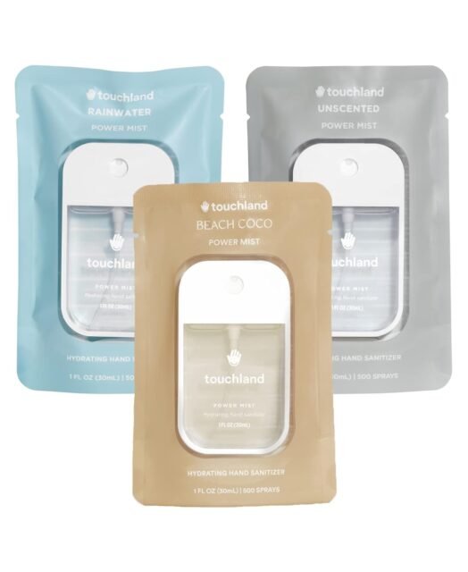 Three Touchland Power Mist Hydrating Hand Sanitizer sprays in 1 FL. OZ. travel-size bottles – Rainwater, Unscented, and Beach Coco – shown in their packaging.