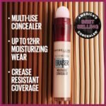 Promotional image of Maybelline New York’s Instant Age Rewind Eraser Multi-Use Concealer with sponge applicator, set against vertical brown and beige swatches. Text highlights its multi-use, 12-hour moisturizing wear, and crease-resistant coverage, with a badge stating “America’s Best Selling Concealer.”